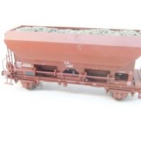 Roco 76576 HO Selbstentladewagen Bauart Fcs DR Ep.IV mit Ladegut